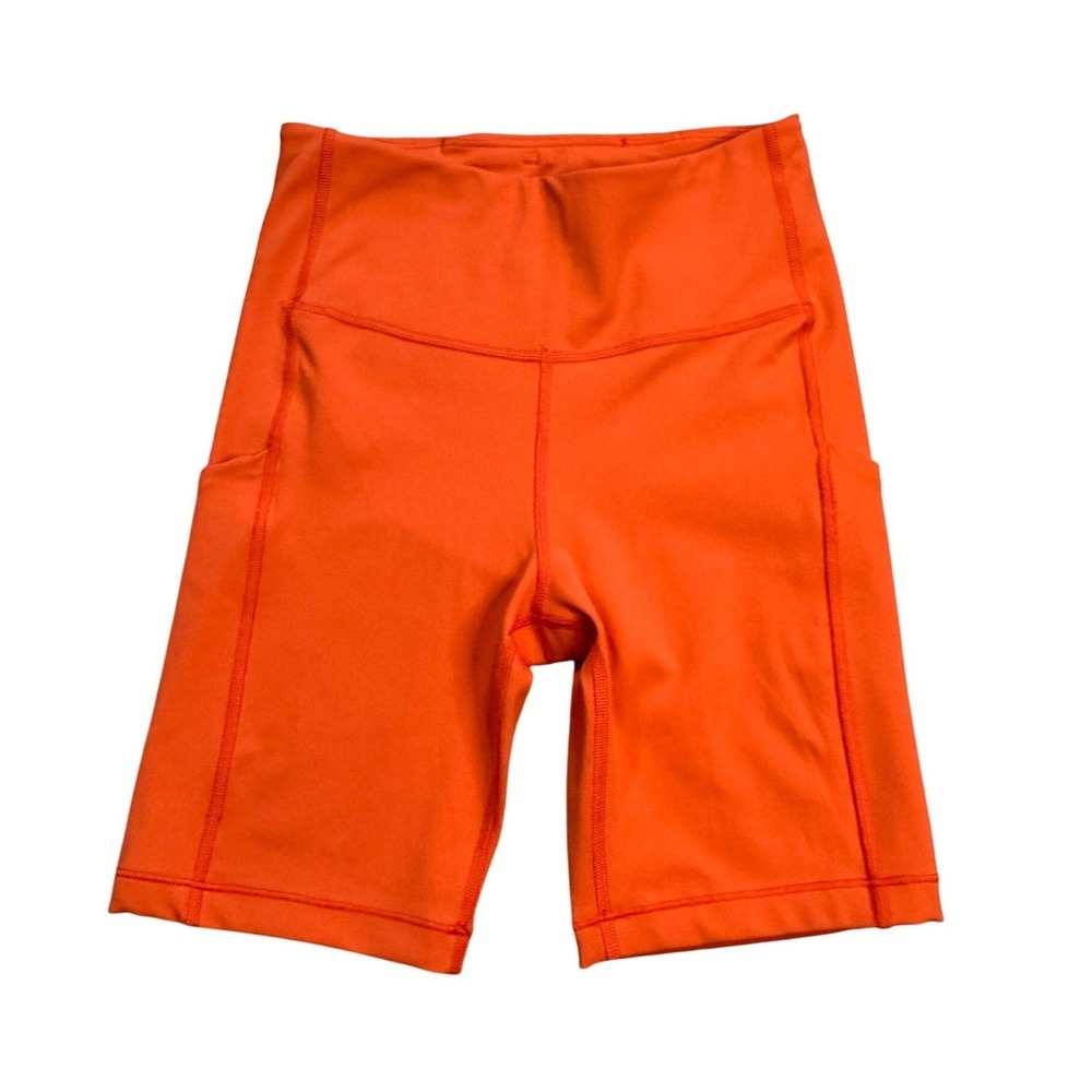 Athleta Ultimate Stash Pocket Bike Shorts XS Orange Clean Sporty Athletic EUC